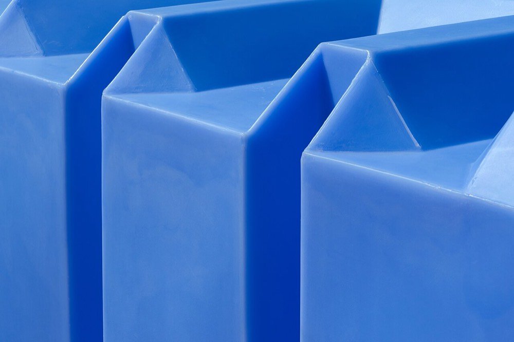 Blue plastic water storage tanks